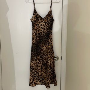 Forever 21 midi, spaghetti strap cheetah print dress. Size small.